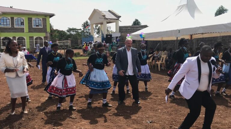 Dr. Tim enjoys dancing with the students