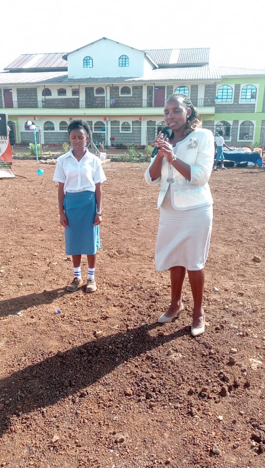 Jacinta introduces the most outstanding student, Mercy.