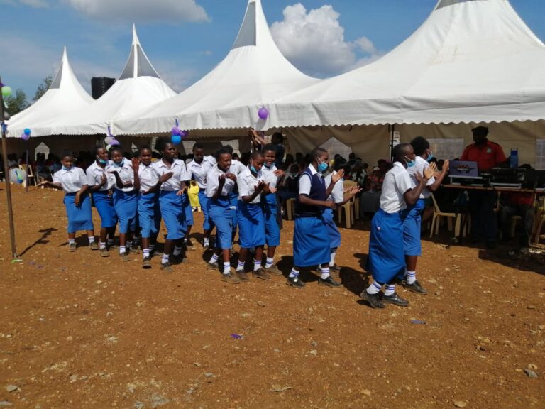 Students entertain attending guests with song and dance