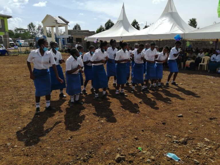 Students entertain attending guests with song and dance