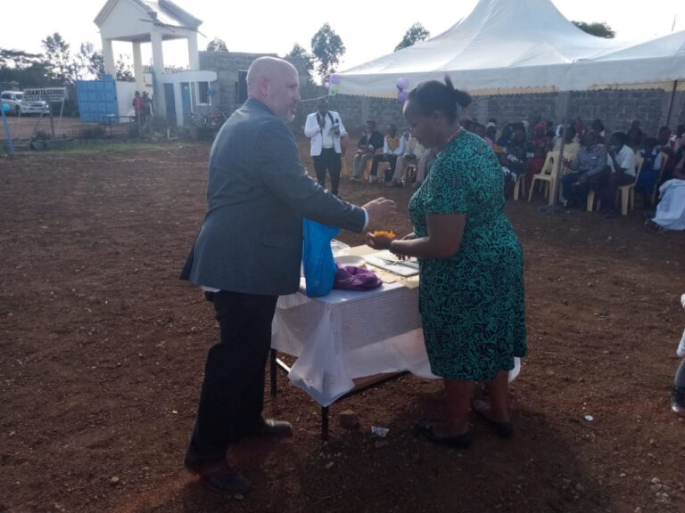 The cake to celebrate the ceremony is brought out